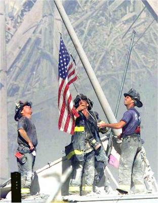 wtc-firefighters-raising-flag.jpg