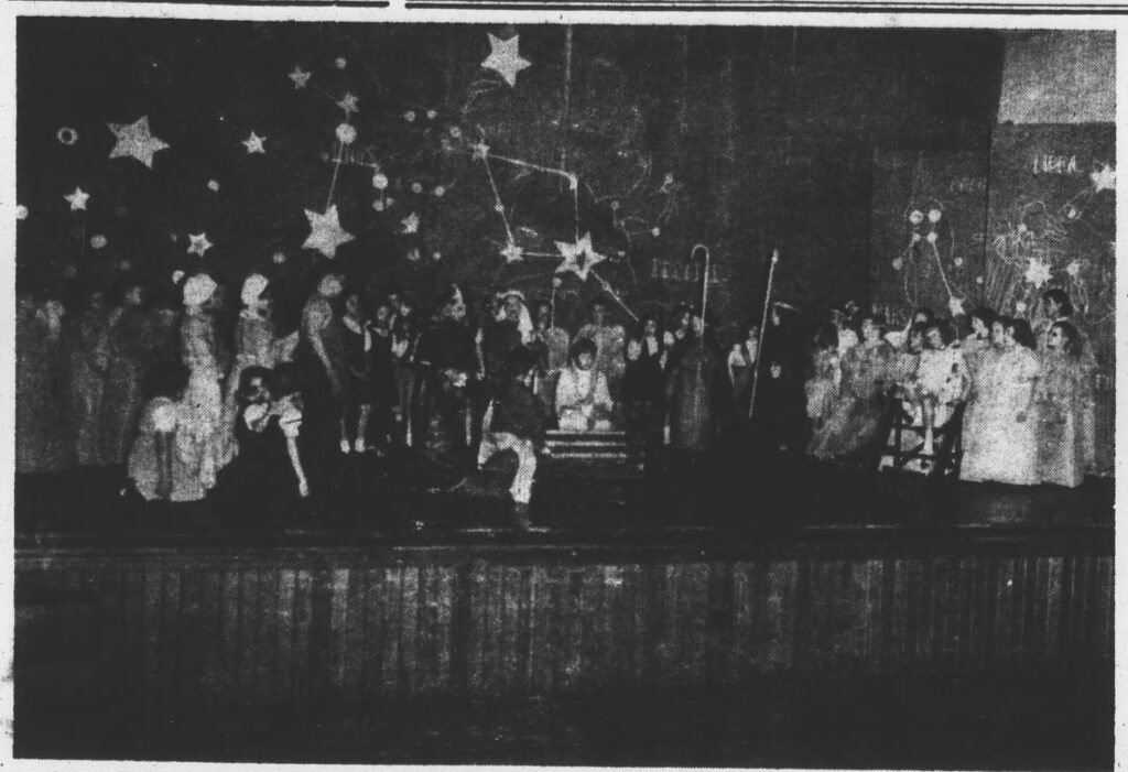 a dark photo digitized from the front page of the december 24, 1953 edition of the Rockbridge (VA) County News was taken near the finale of the Lexington High School performance of The Comet, a locally created play telling the Christmas story from the viewpoint of the Star of Bethlehem, the comet of the title. barely distinguishable costumed white children in clumps stand on a stage and perhaps the nativity scene can be identified or inferred at the center, but the interest here is in the multi-panel painted backdrop of a night sky, with stars of varying shapes, some with the lines and labels of constellations, some with faintly drawn outlines of the constellations' mythical figures, nebulous clouds, and, we're told from a description, the planet saturn. frankly I can't find it. Anyway, this was painted by 25-year old Cy Twombly, who had already begun his exhibiting career, traveled to Europe and Africa and back, and was home for Christmas and asked to lend a hand. Apparently the backdrops he painted as a high school student 6 years ago had left quite an impression on the local audience.