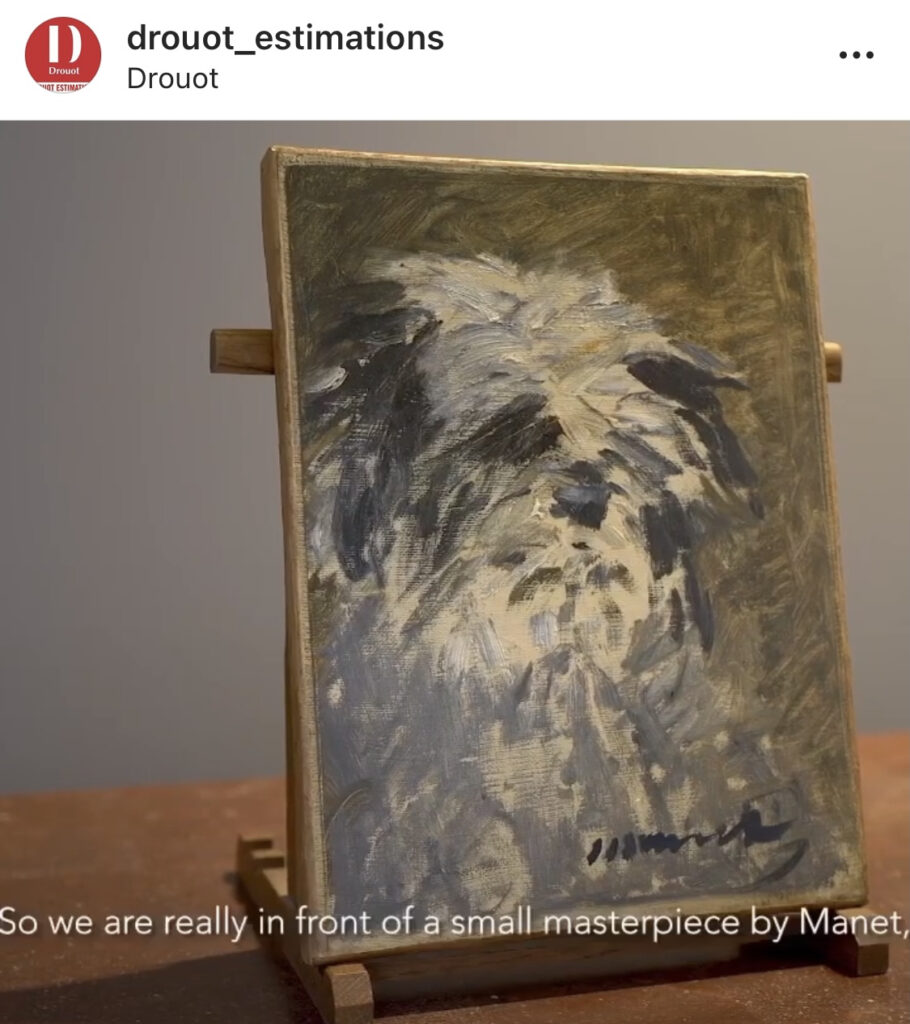 an instagram photo of a laptop-sized manet painting of a shaggy black & white dog, without a frame, resting on a wooden easel on top of a glossy wood side table, at the auction house druout in paris, febrary 2021