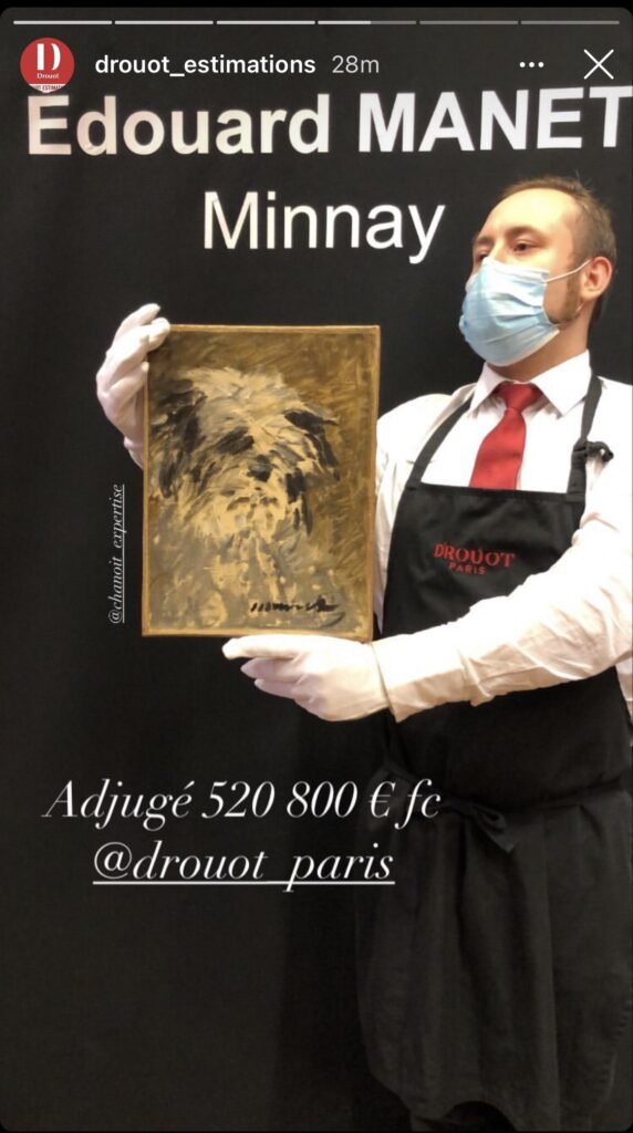 insta screenshot of a drouot auctioneer in paris holding manet's dog portrait minnay, with white gloves while wearing a mask, because it was a pandemic, in a black apron against a black bacground, and a text caption announcing it had sold for 520,800 euros