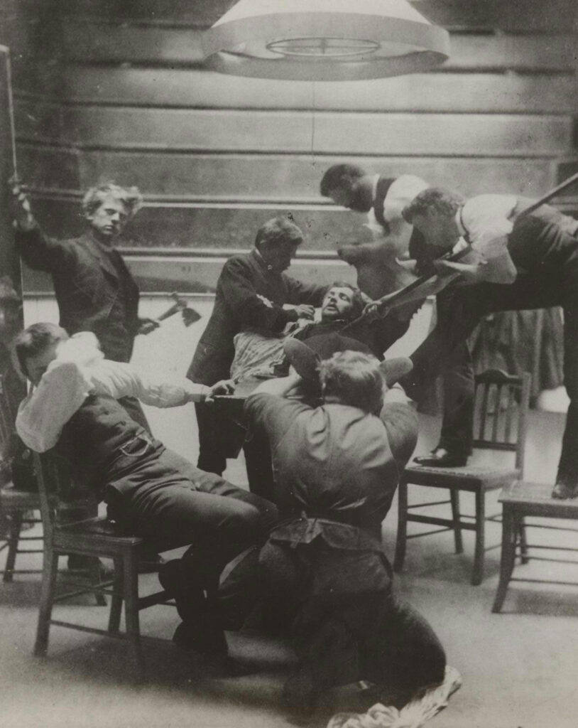 Eakins' goofballs are all on the floor of the operating theater now, pretending to carve up or react to the carving up of one of them who lies, foreshortened as a mantegna corpse, on the table. One guy on the left is gesturing grandly while holding a hatchet. another, standing on chairs, looks like he's plunging a spear into the patient's heart. one guy in the foreground crouches down, his back to the camera, holding the vic's feet, and a drama queen in a chair on the left grips the table with one hand and buries his face in his other elbow, cringe. these are not serious people.