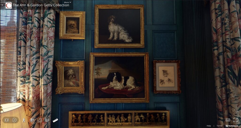 a christie's vr screenshot showing the blue lacquered paneling in ann getty's second or third parlour, which is covered with an arrangement of dog portraits, both paintings and sketches, flanked by floral printed draperies. a bit of a pleated lampshade sticks into the lower left corner. the larger, forgettable dog paintings in the center are of king charles spaniels. the two little manets are of yappy french lapdogs, bob is brown, souki is black and white with red bows. there's also a sketch by manet of three dog heads on a sheet of paper, but they are not important now
