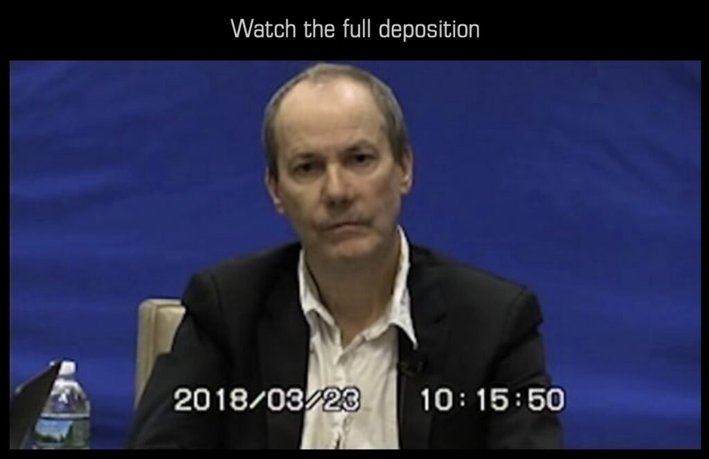 a screenshot of richard prince, an older white guy with short receding brown hair, in a white shirt and dark blazer, sitting at an office chair against a blue chroma backdrop, with a bottle of water next to him. time codes in this video screenshot indicate the date and hour in 2018 when he was recorded giving a deposition in his second and third big copyright infringement lawsuits, a supertitle, watch the full deposition, is left over from the very brief moment in 2023 when this video was viewable online at deposition row dot com