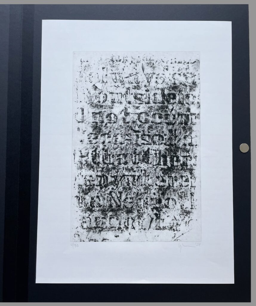 a glenn ligon print of a carbon and graphite rubbing made on kozo (mulberry) paper of the surface of a glenn ligon painting, which is comprised of repeated stencilings of a text by james baldwin. which is all good to know, but the print of the rubbing drawing is even more illegible than the thickest parts of the painting, with just forms of some letters coming through. the print is set in a very sleek and stylish but not overly fussy black folder, which they call a wallet, which appears to have a small disk magnet closure. it is available for sale at the website where i ganked this image, curating cambridge dot co dot uk