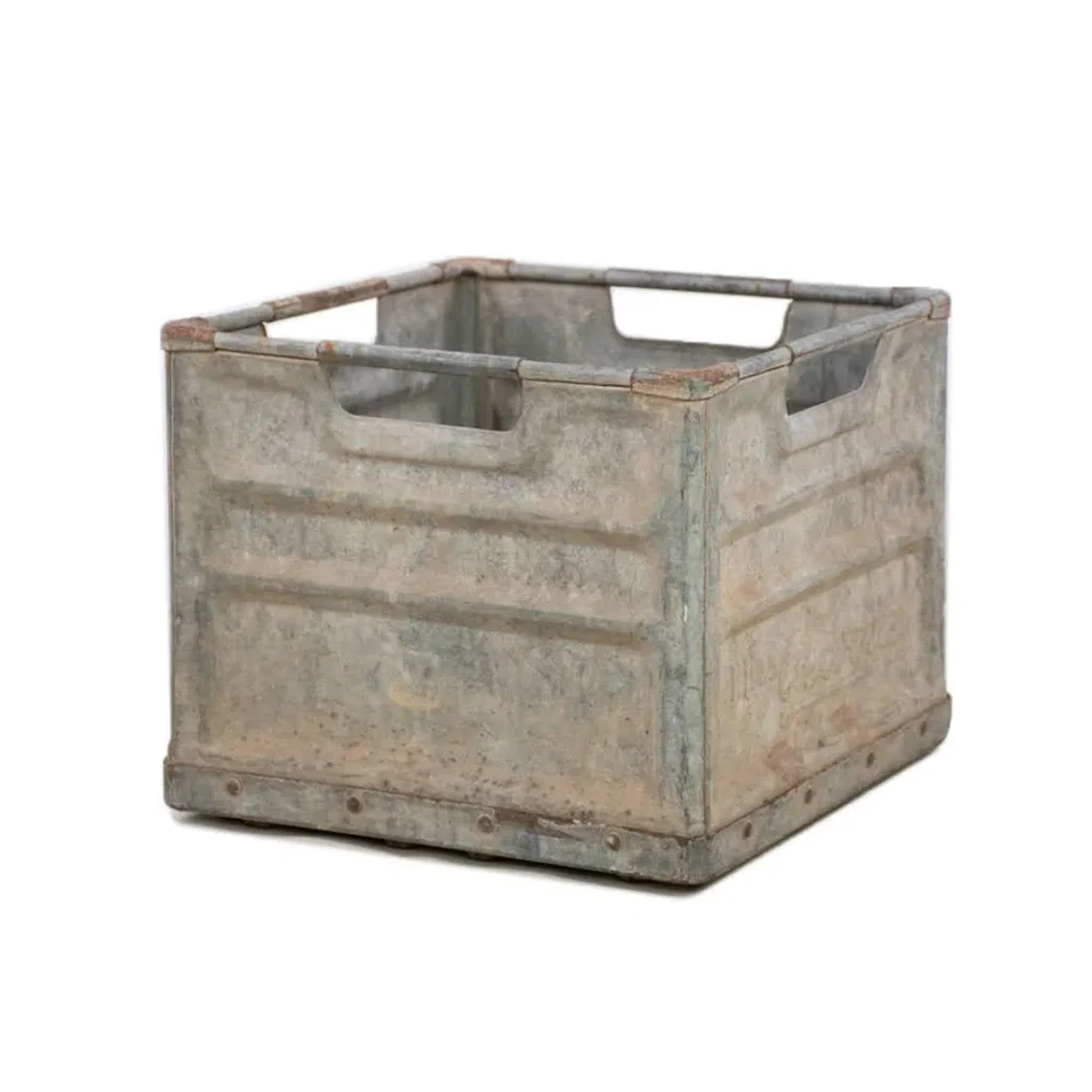 a heavily patinated galvanized metal milk crate, square with solid sides and open handles on all four sides, via atlanta auctions