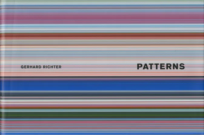 the cover of gerhard richter's artist book, patterns, has narrow horizontal striations of blue, green, pinks and pale blues and yellows running across it.