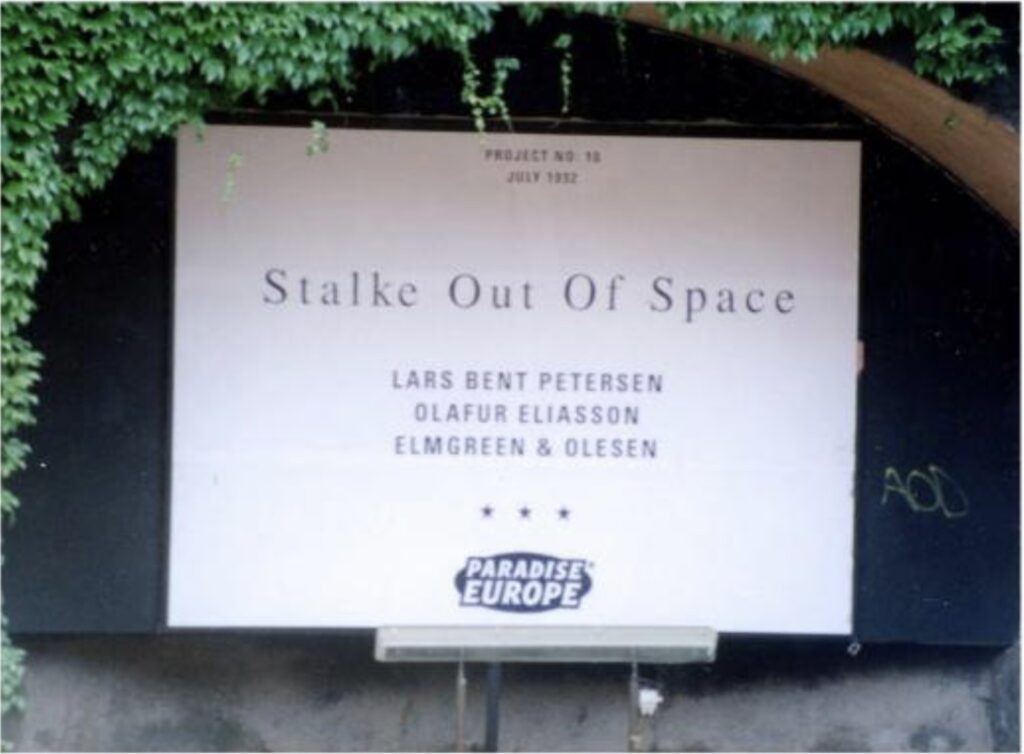 a poster for paradise europe, a 1992 exhibition of posters and billboards by artists in copenhagen, that reads stalke out of space/ lars bent petersen/ olafur eliasson/ elmgreen & olesen in dark blue or black on an otherwise blank white sheet.