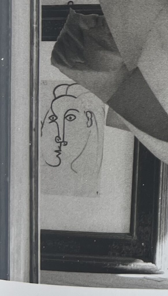 detail of what's described as a pablo picasso drawing, which would be better called a work on paper. it appears to be done by brush in just a couple of strokes, from ugo mulas' photo in cy twombly homes and studios