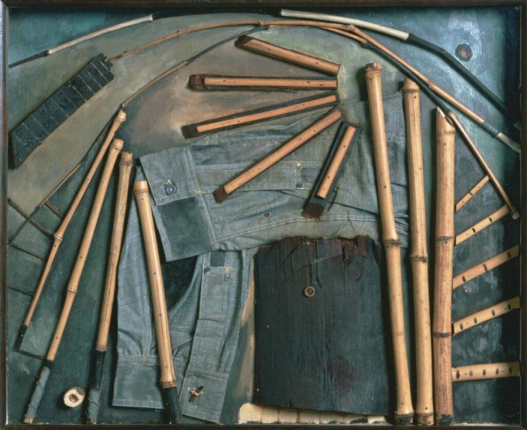 color image of arthur dove's 1925 assemblage now titled goin' fishin' is an abstract portrait of a Black man fishing on a pier. The black-painted section of dock wood at the bottom center with the button eye represents his head, while the bamboo fishing pole segments running vertically next to it, and the five pieces spread out atop blackpainted strips of wood, represent the man's raised arm and hand. other pieces of the bamboo pole arc across the top, or are arrayed on either side of the head. underneath them are denim shirt cuffs. somehow after the n-word was removed from the title, people forgot or lost the ability to read this as a portrait rather than an abstract evocation or whatever. anyway, the phillips collection is, as of february 2025, still doing the work of accountability and transparency for their participation in the maintenance of white supremacist structures in our society. so that's something.