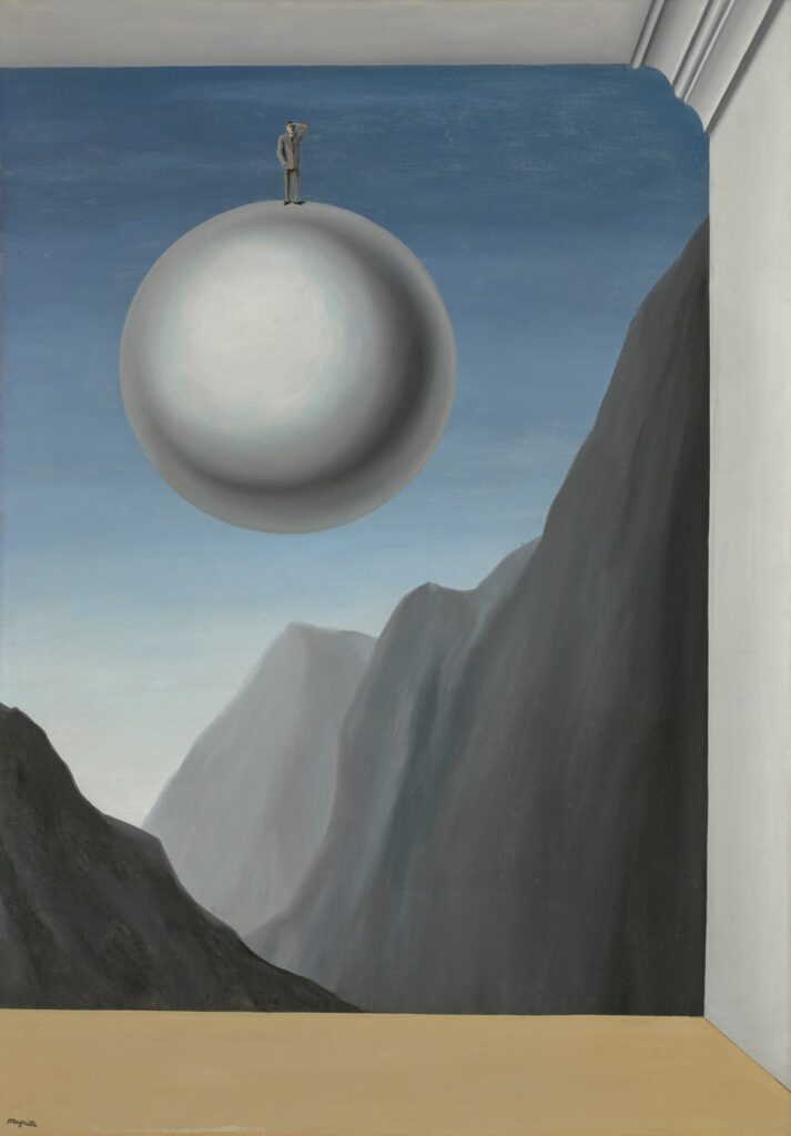 magritte's painting of a space with tan floor, white wall and ceiling, whose joint is marked by a thick molding, all frame three sides of the rest of the image, which is a large, featureless silvery orb floating over a craggy grey mountainscape. a man in a hat and suit stands atop the orb, which is 4-5x his height. this painting is selling at christie's london in march 2025