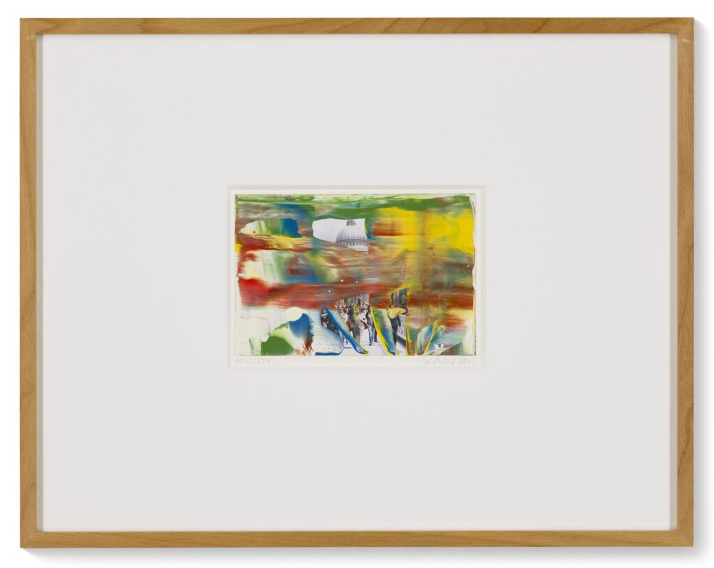 a framed snapshot of st pauls cathedral overpainted iwth red green and yellow squeegeed paint, mv.177, a 2011 work by gerhard richter being sold at christies in march 2025