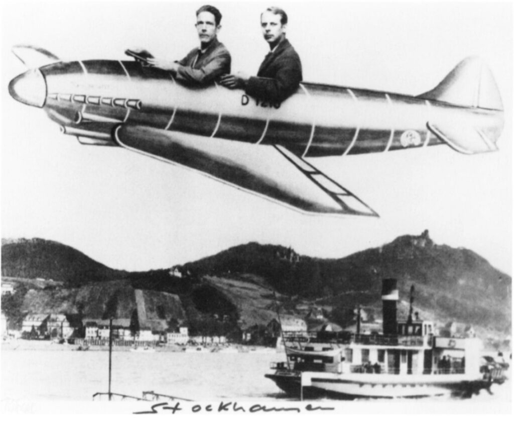 a black and white souvenir photo from 1958 of two white men in suits, john cage and karlheinz stockhausen, with their left arms draped over the edge of a painted cardboard picture of a junker plane, as if they're riding in an open car. the plane image is composited above a landscape photo of a ferry on the rhine, with the iconic ruins of a medieval castle on top of the famous mountain, drachenfels in the background. the whole image is blurry as if it's been copied and reprinted several times over. from october magazine, august 1997