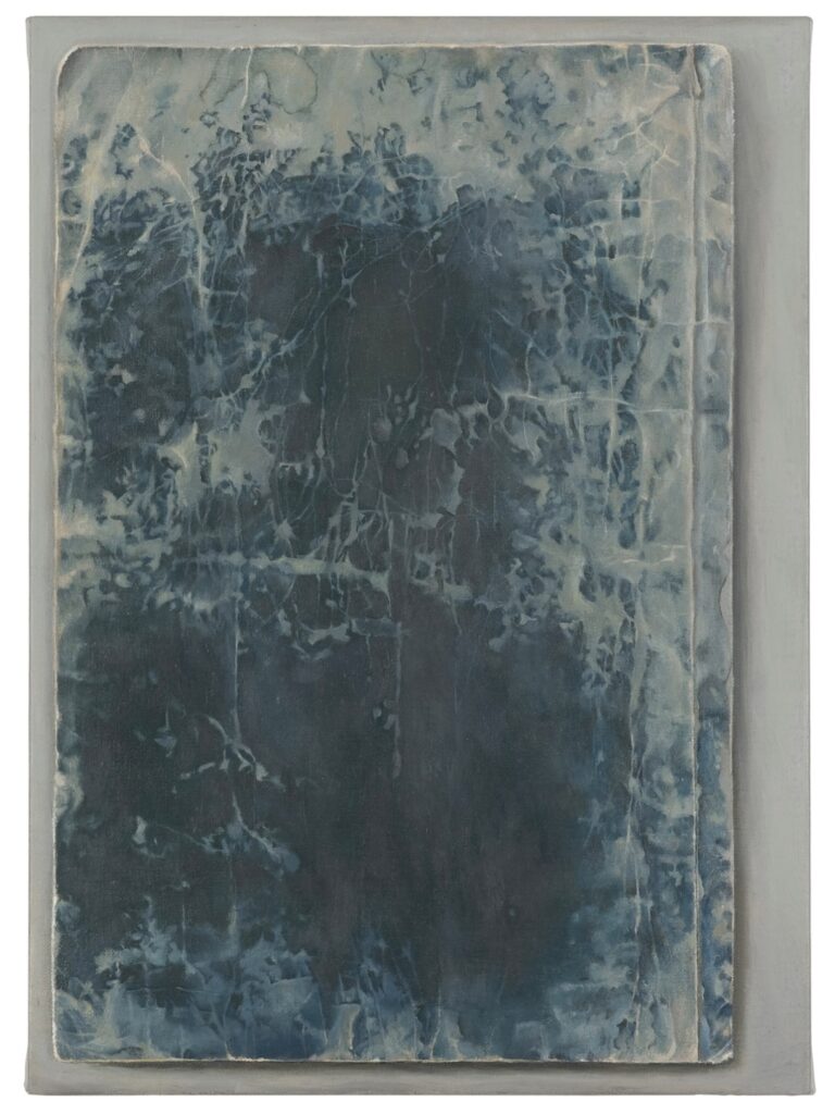 a vertically oriented painting of the cracked faded and unevenly worn indigo cover of a japanese book, with a slight border around it, and shadows and a bit of a crease in the corner, all giving a hint of an object in space, not just a picture of it, by vija celmins via matthew marks gallery